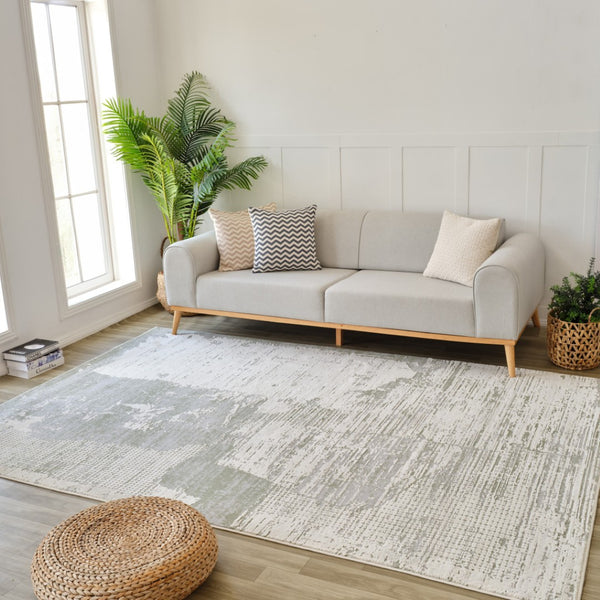 HomeRoots 4' Beige and Green Abstract Distressed Area Rug - Stylish, Stain-Resistant Design for Home Spaces 7' X 10' 558850