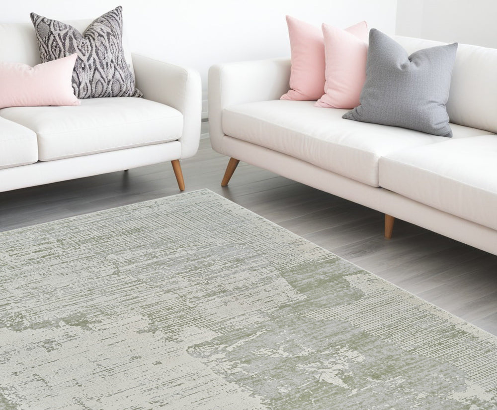 Homeroots 7' X 10' Beige And Green Abstract Distressed Area Rug  Polypropylene 558850