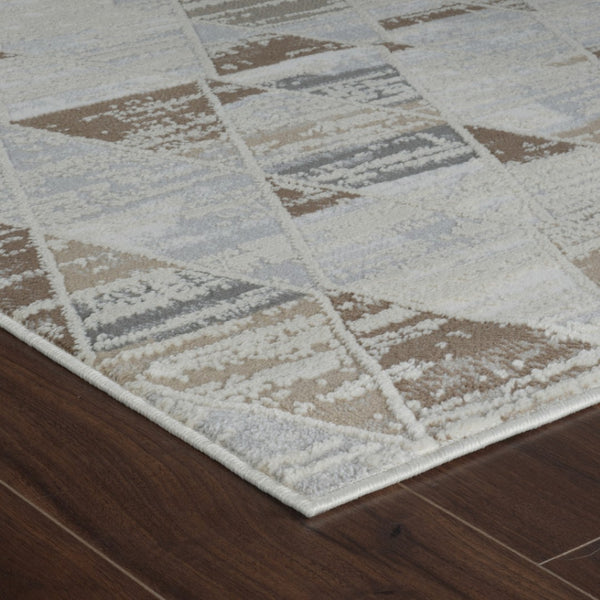 HomeRoots 4' Beige and Brown Abstract Distressed Area Rug - Modern, Stain-Resistant, Perfect for Any Room 4' X 6' 558852