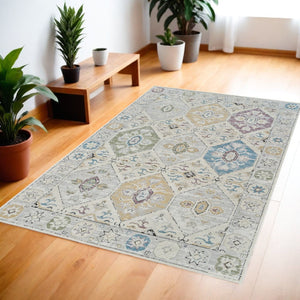 HomeRoots 4' Abstract Distressed Beige and Gray Area Rug - Modern, Soft, Stain-Resistant Design for Cozy Homes 4' X 6' 558856