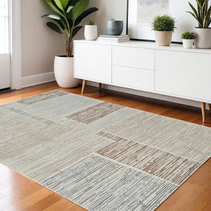 Homeroots 4' X 6' Beige And Brown Abstract Distressed Area Rug  Polypropylene 558864