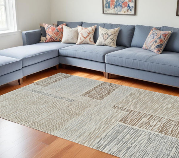 HomeRoots 4' Beige and Brown Abstract Distressed Area Rug - Durable, Stylish, and Easy-Care for Modern Homes 7' X 10' 558866