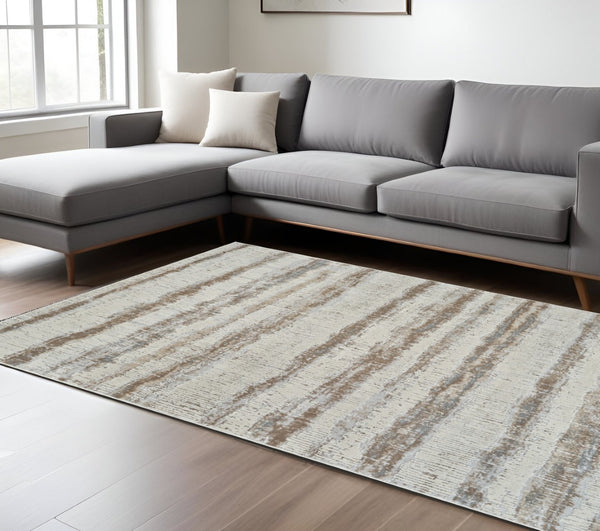 HomeRoots 4' Abstract Beige and Brown Non-Skid Area Rug - Modern, Stain-Resistant Design for Any Room 7' X 10' 558890