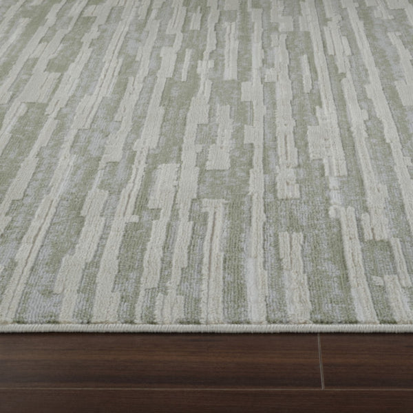 HomeRoots 4' Abstract Distressed Area Rug in Beige and Green - Versatile, Soft, Durable for Modern Homes 4' X 6' 558896