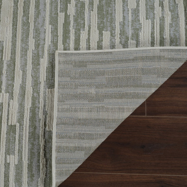 HomeRoots 4' Abstract Distressed Area Rug in Beige and Green - Versatile, Soft, Durable for Modern Homes 4' X 6' 558896