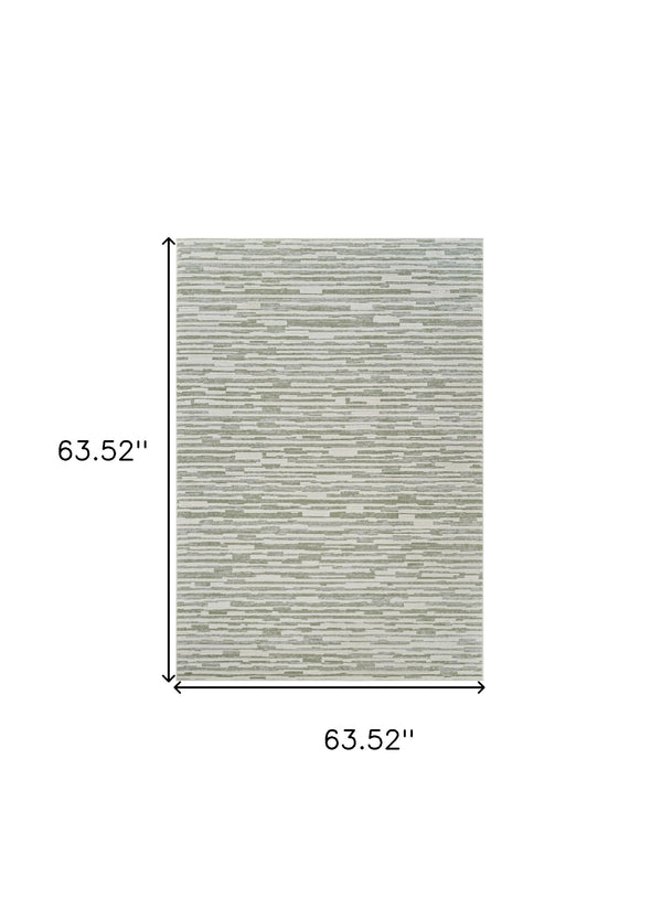 Homeroots 5' X 8' Beige And Green Abstract Distressed Area Rug  Polypropylene 558897