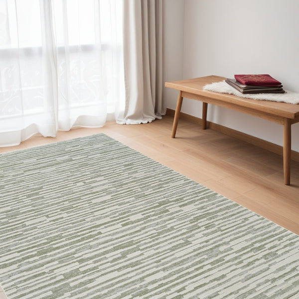 Homeroots 5' X 8' Beige And Green Abstract Distressed Area Rug  Polypropylene 558897