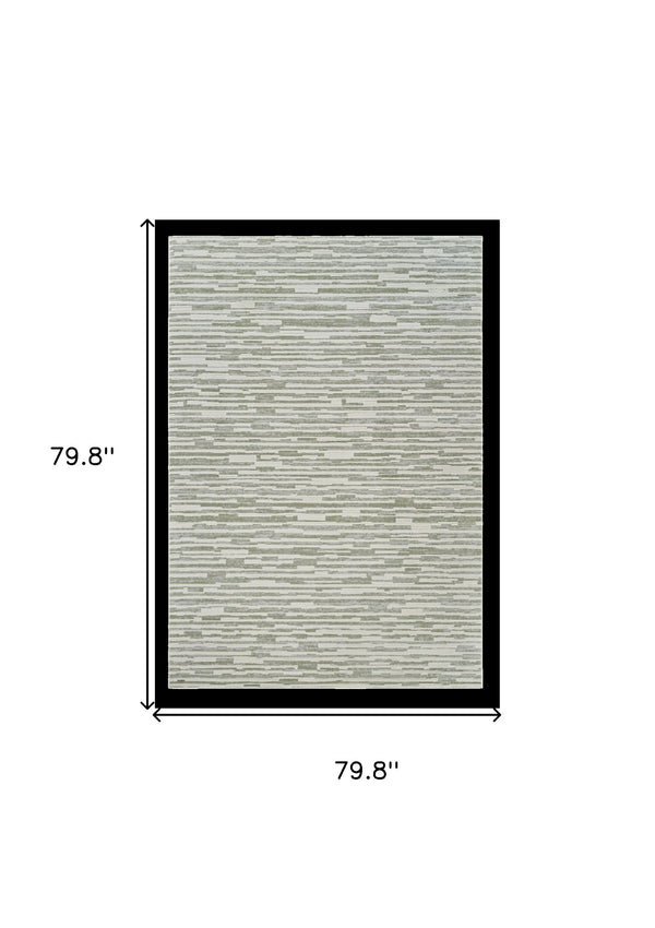 Homeroots 7' X 10' Beige And Green Abstract Distressed Area Rug  Polypropylene 558898