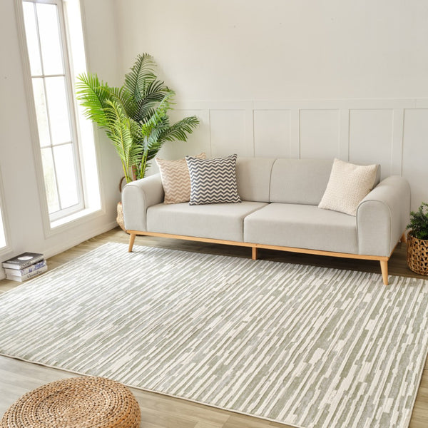 HomeRoots 4' Abstract Distressed Area Rug in Beige and Green - Versatile, Soft, Durable for Modern Homes 7' X 10' 558898