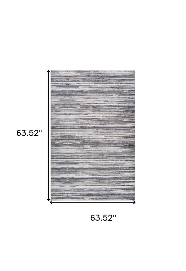 HomeRoots 5' Blue and Gray Abstract Distressed Area Rug - Modern Artistry for Stylish, Durable Living Spaces 5' X 8' 558917