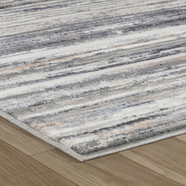 HomeRoots 5' Blue and Gray Abstract Distressed Area Rug - Modern Artistry for Stylish, Durable Living Spaces 5' X 8' 558917