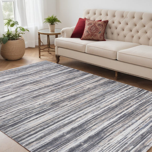 HomeRoots 5' Blue and Gray Abstract Distressed Area Rug - Modern Artistry for Stylish, Durable Living Spaces 5' X 8' 558917