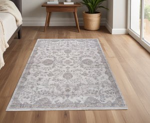 Homeroots 4' X 6' Beige And Gray Floral Distressed Area Rug  Polyester 558932