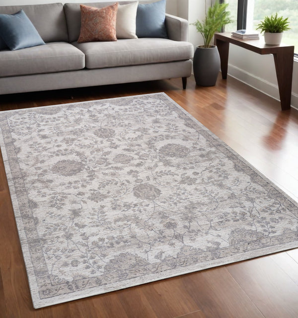 Homeroots 5' X 8' Beige And Gray Floral Distressed Area Rug  Polyester 558933