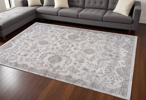 Homeroots 8' X 11' Beige And Gray Floral Distressed Area Rug  Polyester 558935