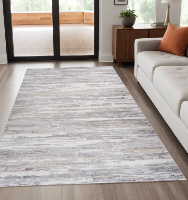 Homeroots 5' X 8' Beige And Gray Abstract Worn Faded Area Rug  Polyester 558957