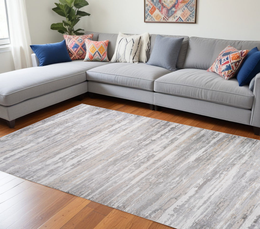 Homeroots 8' X 11' Beige And Gray Abstract Worn Faded Area Rug  Polyester 558959