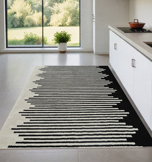 Homeroots 4' X 6' Cream And Black Abstract Distressed Area Rug  Polypropylene 559012