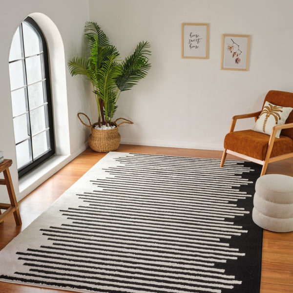 HomeRoots 4' Cream and Black Abstract Distressed Area Rug – Modern Style, Plush Comfort, Durable for Homes 7' X 10' 559014