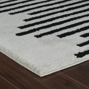 HomeRoots 4' Cream and Black Abstract Distressed Area Rug – Modern Style, Plush Comfort, Durable for Homes 7' X 10' 559014