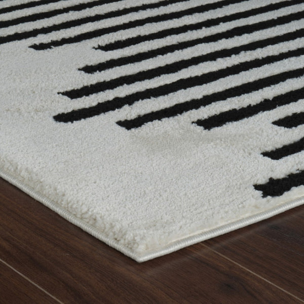 HomeRoots 4' Cream and Black Abstract Distressed Area Rug – Modern Style, Plush Comfort, Durable for Homes 7' X 10' 559014