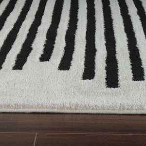 HomeRoots 4' Cream and Black Abstract Distressed Area Rug – Modern Style, Plush Comfort, Durable for Homes 7' X 10' 559014