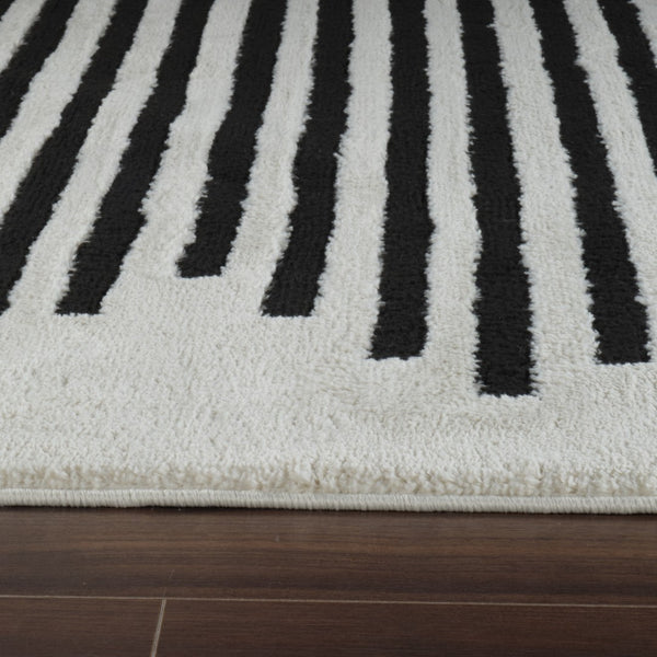 HomeRoots 4' Cream and Black Abstract Distressed Area Rug – Modern Style, Plush Comfort, Durable for Homes 7' X 10' 559014