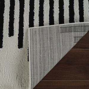 HomeRoots 4' Cream and Black Abstract Distressed Area Rug – Modern Style, Plush Comfort, Durable for Homes 7' X 10' 559014