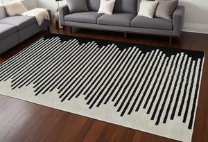 HomeRoots 4' Cream and Black Abstract Distressed Area Rug – Modern Style, Plush Comfort, Durable for Homes 7' X 10' 559014