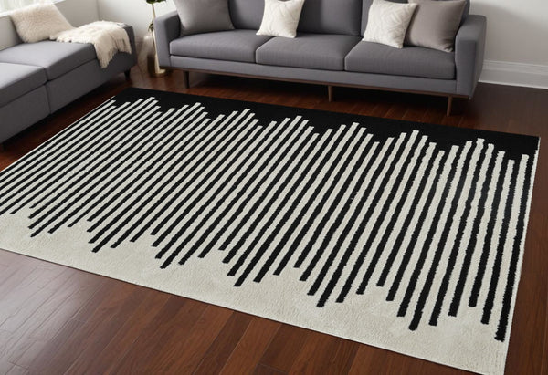 HomeRoots 4' Cream and Black Abstract Distressed Area Rug – Modern Style, Plush Comfort, Durable for Homes 7' X 10' 559014
