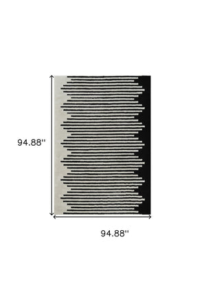 Homeroots 8' X 11' Cream And Black Abstract Distressed Area Rug  Polypropylene 559015