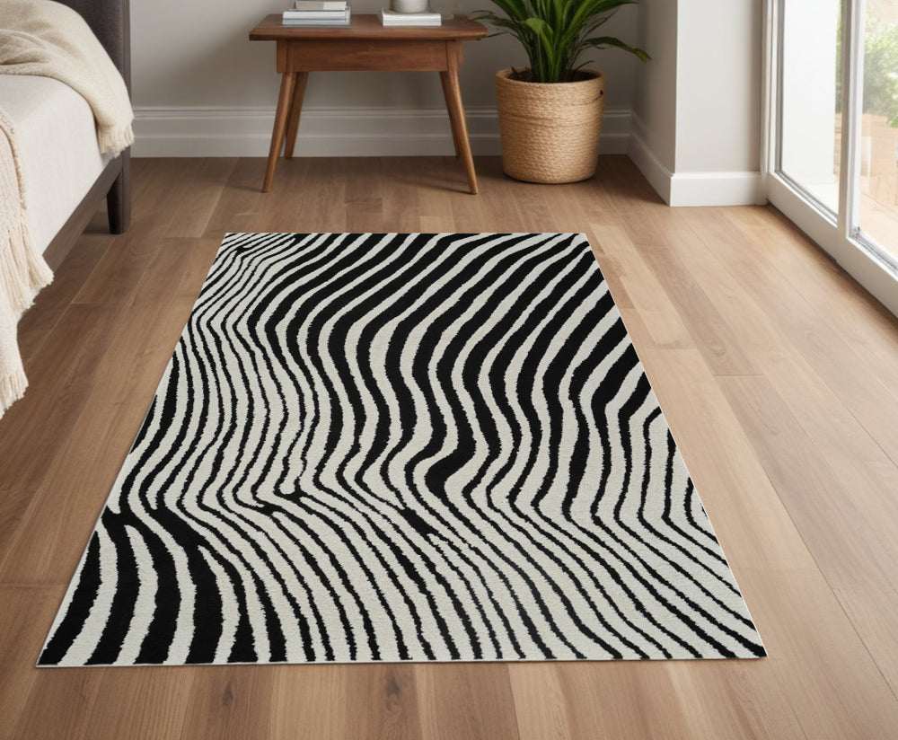 Homeroots 4' X 6' Cream And Black Abstract Distressed Area Rug  Polypropylene 559016