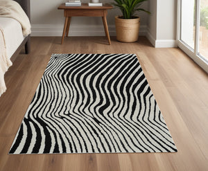 Homeroots 4' X 6' Cream And Black Abstract Distressed Area Rug  Polypropylene 559016