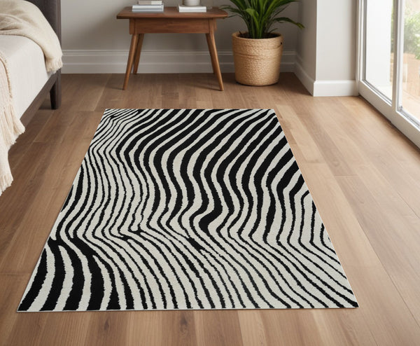 Homeroots 4' X 6' Cream And Black Abstract Distressed Area Rug  Polypropylene 559016