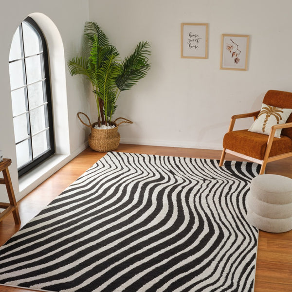 HomeRoots 4' Cream and Black Abstract Distressed Area Rug - Durable, Stylish, Easy-Care Flooring for Homes 5' X 8' 559017