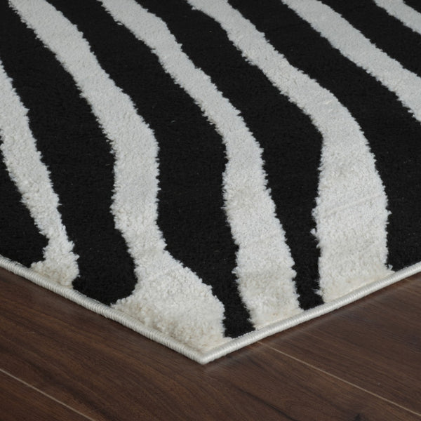 HomeRoots 4' Cream and Black Abstract Distressed Area Rug - Durable, Stylish, Easy-Care Flooring for Homes 5' X 8' 559017