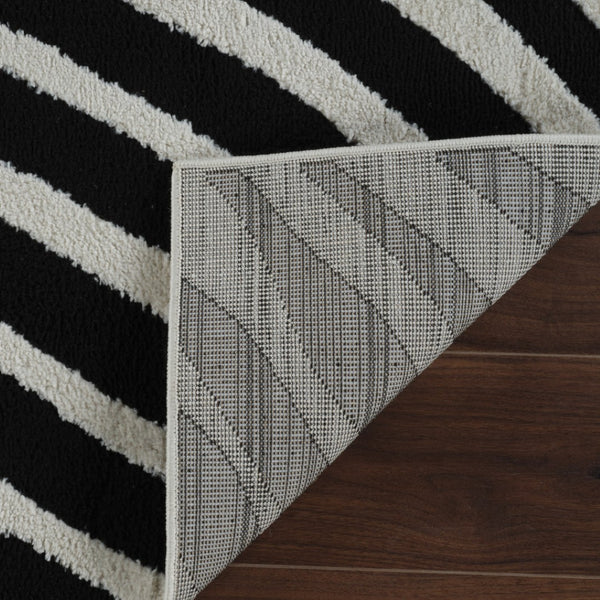 HomeRoots 4' Cream and Black Abstract Distressed Area Rug - Durable, Stylish, Easy-Care Flooring for Homes 5' X 8' 559017