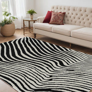 HomeRoots 4' Cream and Black Abstract Distressed Area Rug - Durable, Stylish, Easy-Care Flooring for Homes 5' X 8' 559017