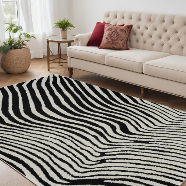 HomeRoots 4' Cream and Black Abstract Distressed Area Rug - Durable, Stylish, Easy-Care Flooring for Homes 5' X 8' 559017