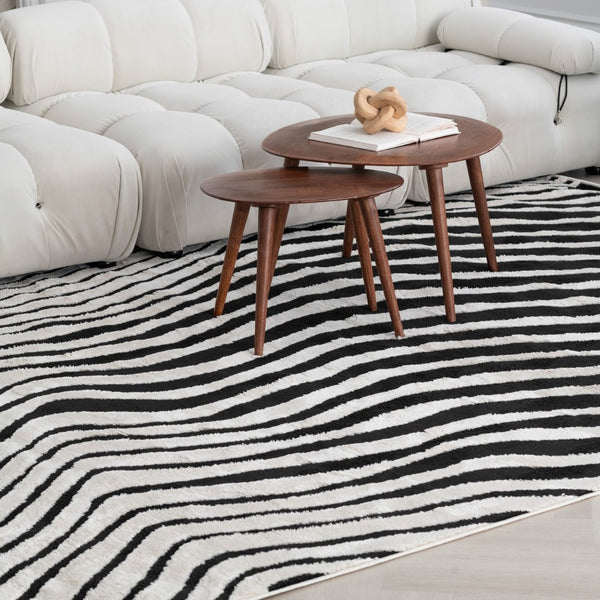 HomeRoots 4' Cream and Black Abstract Distressed Area Rug - Durable, Stylish, Easy-Care Flooring for Homes 5' X 8' 559017