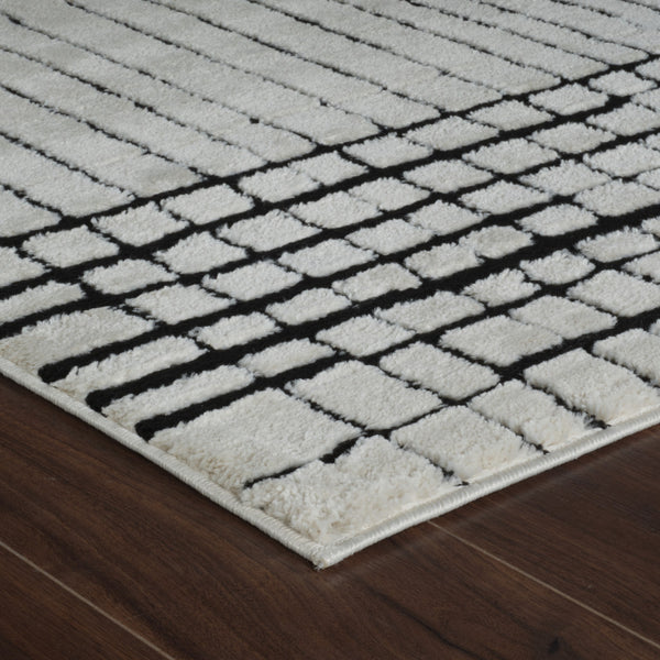 Homeroots 4' X 6' Cream And Black Abstract Distressed Area Rug  Polypropylene 559020