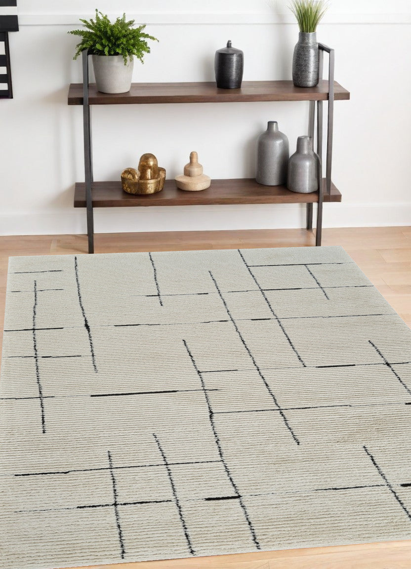 Homeroots 4' X 6' Cream And Green Abstract Distressed Area Rug  Polypropylene 559024