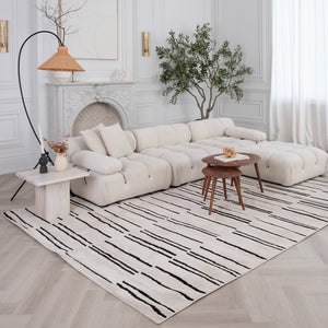 Homeroots 5' X 8' Cream And Black Abstract Worn Faded Area Rug  Polypropylene 559029