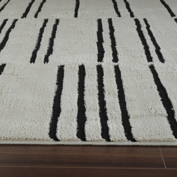 Homeroots 5' X 8' Cream And Black Abstract Worn Faded Area Rug  Polypropylene 559029