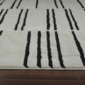 Homeroots 8' X 11' Cream And Black Abstract Distressed Area Rug  Polypropylene 559031