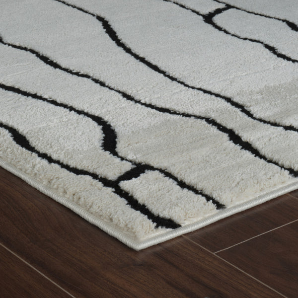 Homeroots 5' X 8' Cream And Black Abstract Distressed Area Rug  Polypropylene 559033