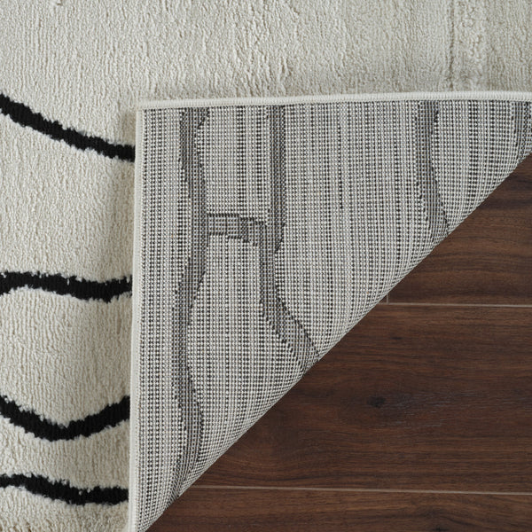 Homeroots 7' X 10' Cream And Black Abstract Distressed Area Rug  Polypropylene 559034