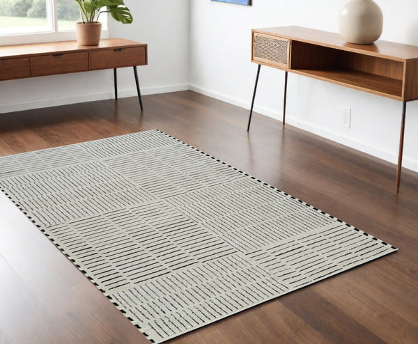 Homeroots 4' X 6' Cream And Black Abstract Distressed Area Rug  Polypropylene 559036