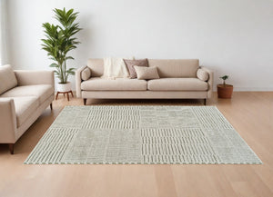 HomeRoots 4' Cream and Green Abstract Distressed Area Rug – Modern Softness and Durability for Any Room 7' X 10' 559042