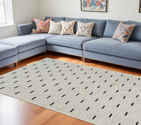 HomeRoots 4' Cream and Black Abstract Distressed Area Rug – Modern Design, Stain-Resistant, Durable Style for Any Space 7' X 10' 559046